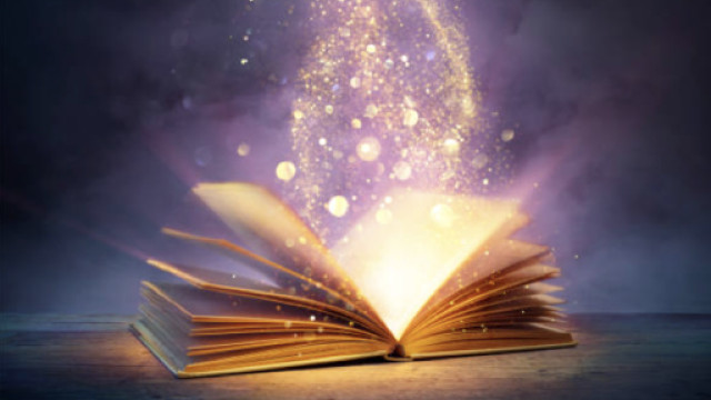un libro aperto dal quale escono luci e stelle