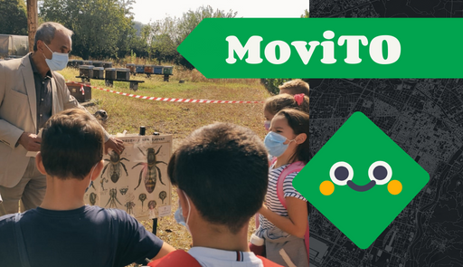immagine con gruppo di insegnante e bambini in un apiario