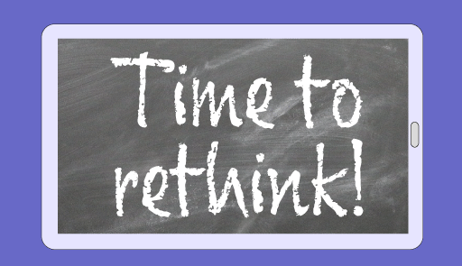 Una lavagnetta con scritta Time to rethink