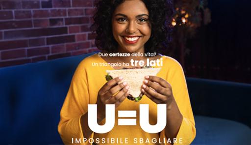 U=U Impossibile sbagliare - Iniziative per la Giornata Mondiale contro l’AIDS Ragazza sorridente con in mano un tramezzino, frase: Due certezze nella vita? Un triangolo ha tre lati. U=U, impossibile sbagliare