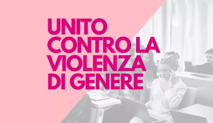 UniTo contro la violenza di genere - Lezioni universitarie Studenti a lezione con scritta UniTo contro la violenza di genere su sfondo rosa