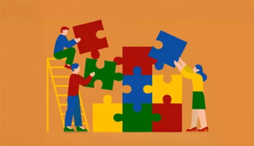 persone che costruiscono un puzzle